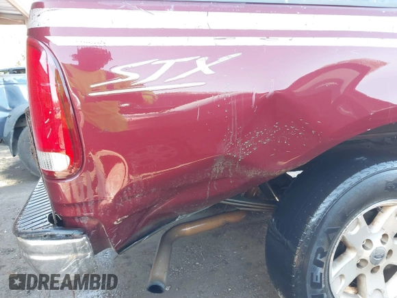 1999 Ford F-150 with VIN 1FTZF1722XKA76885, listed as a IAAI auction lot 41824733 with Not provided miles and . Bid and sale history available at DreamBid. Image 6.