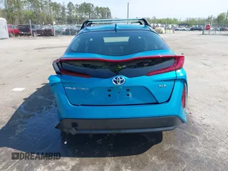 2021 Toyota Prius LE with VIN JTDKAMFP7M3180504, listed as a IAAI auction lot 41985409 with 56,617 mi miles and . Bid and sale history available at DreamBid. Image 16.