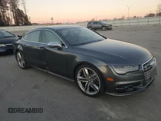 2016 Audi S7 with VIN WAUW2AFC1GN010008, listed as a Copart auction lot 88571445 with 126,480 mi miles and Salvage Title. Bid and sale history available at carsss.com. Image 4.