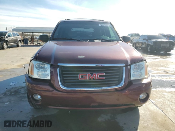 2003 GMC Envoy SLT with VIN 1GKDT13S732378731, listed as a Copart auction lot 88340825 with 125,814 mi miles and Salvage Title. Bid and sale history available at carsss.com. Image 5.