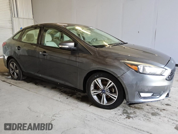 2017 Ford Focus SE with VIN 1FADP3FE2HL346276, listed as a Copart auction lot 43392285 with 120,403 mi miles and Clean Title. Bid and sale history available at carsss.com. Image 4.