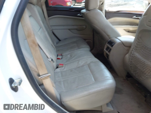 2011 Cadillac SRX Premium Collection z VIN 3GYFNCEYXBS579760, wystawiony jako IAAI lot #42238707 z przebiegiem Nie podano mil oraz . Historia ofert i sprzedaży dostępna na DreamBid. Obrazek 8.