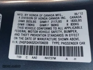 2012 Honda Civic Cpe Si with VIN 2HGFG4A52CH704659, listed as a IAAI auction lot 40991910 with 153,560 mi miles. Bid and sale history available at carsss.com. Image 9.