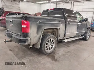 2015 GMC Sierra 1500 Denali with VIN 3GTU2WEC7FG129925, listed as a IAAI auction lot 41731496 with 165,168 mi miles. Bid and sale history available at carsss.com. Image 4.