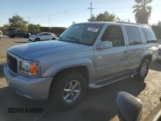 2000 GMC Denali z VIN 1GKEK63R8YR212220, wystawiony jako Copart lot #77606364 z przebiegiem 337 467 mil mil oraz Tytuł czysty. Historia ofert i sprzedaży dostępna na DreamBid. Obrazek 1.