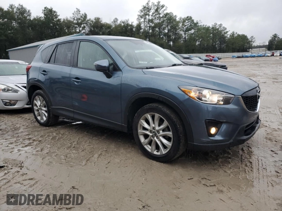 2015 Mazda CX-5 Grand Touring with VIN JM3KE2DY4F0526671, listed as a Copart auction lot 46520505 with 129,017 mi miles and Salvage Title. Bid and sale history available at carsss.com. Image 4.