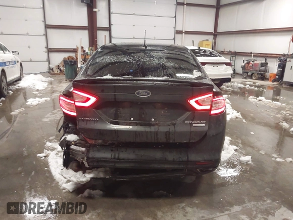 2014 Ford Fusion Titanium with VIN 3FA6P0K92ER336344, listed as a IAAI auction lot 41237225 with 178,169 mi miles. Bid and sale history available at carsss.com. Image 16.