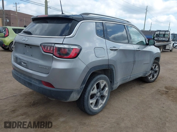 2018 Jeep Compass Limited with VIN 3C4NJDCB9JT267021, listed as a IAAI auction lot 42270830 with 82,437 mi miles and . Bid and sale history available at DreamBid. Image 4.