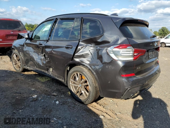 2019 BMW X3 M40i with VIN 5UXTS3C59K0Z06102, listed as a Copart auction lot 74219704 with Not Provided miles and Salvage Title. Bid and sale history available at DreamBid. Image 2.