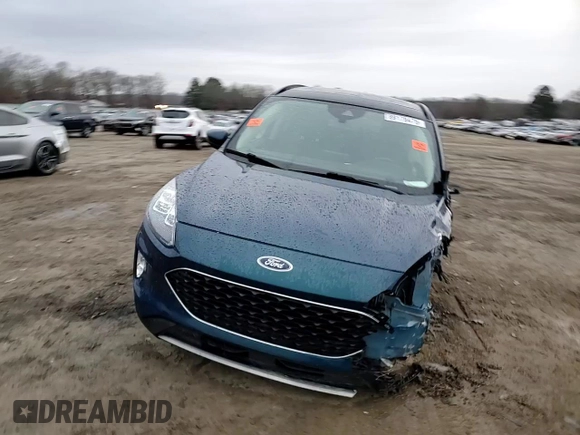 2020 Ford Escape Titanium z VIN 1FMCU9J91LUA73891, wystawiony jako Copart lot #89178475 z przebiegiem 35 579 mil mil oraz Szkoda całkowita • Salvage title. Historia ofert i sprzedaży dostępna na DreamBid. Obrazek 11.