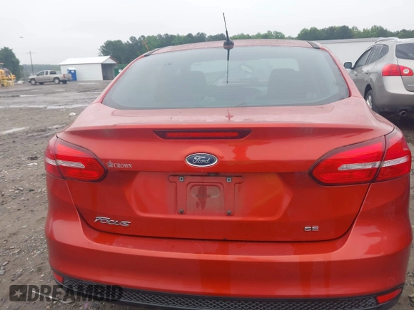 2018 Ford Focus SE with VIN 1FADP3F25JL265039, listed as a IAAI auction lot 42352050 with 140,127 mi miles and . Bid and sale history available at DreamBid. Image 16.