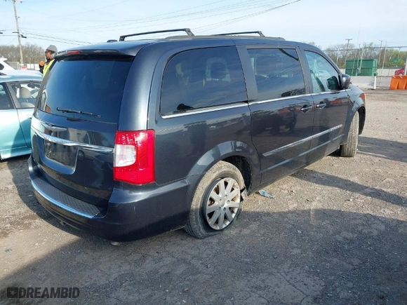 2013 Chrysler Town & Country Touring with VIN 2C4RC1BG7DR706988, listed as a IAAI auction lot 41876208 with 139,238 mi miles. Bid and sale history available at carsss.com. Image 4.
