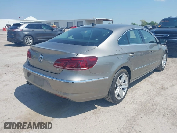 2013 Volkswagen CC Sport with VIN WVWBN7AN2DE555375, listed as a IAAI auction lot 42048643 with 125,484 mi miles and . Bid and sale history available at DreamBid. Image 4.