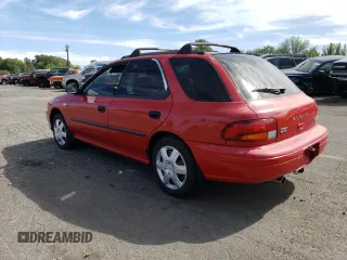 1997 Subaru Impreza L with VIN JF1GF435XVH810083, listed as a Copart auction lot 71054674 with 155,322 mi miles and Salvage title. Bid and sale history available at DreamBid. Image 2.