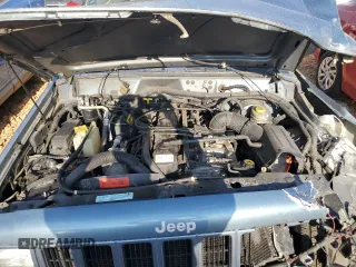 1998 Jeep Cherokee Sport with VIN 1J4FT68S4WL121559, listed as a Copart auction lot 77387794 with 163,453 mi miles and Salvage Title. Bid and sale history available at carsss.com. Image 12.