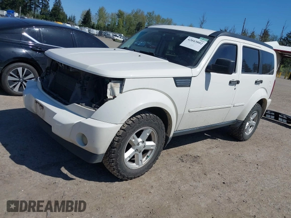 2007 Dodge Nitro SLT z VIN 1D8GU58K07W586777, wystawiony jako IAAI lot #42043802 z przebiegiem 143 324 mil mil oraz . Historia ofert i sprzedaży dostępna na DreamBid. Obrazek 2.