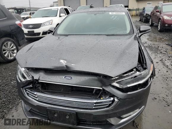2018 Ford Fusion Titanium with VIN 3FA6P0D92JR193919, listed as a Copart auction lot 42188094 with 99,939 mi miles and Salvage title. Bid and sale history available at DreamBid. Image 5.