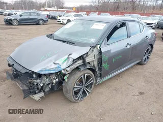 2021 Nissan Sentra SR z VIN 3N1AB8DV4MY302599, wystawiony jako IAAI lot #41662536 z przebiegiem 36 905 mil mil oraz . Historia ofert i sprzedaży dostępna na DreamBid. Obrazek 2.