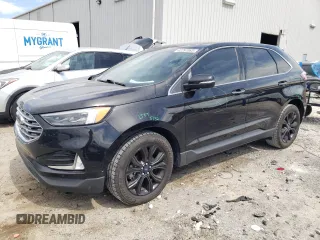 2019 Ford Edge Titanium with VIN 2FMPK3K92KBB81606, listed as a Copart auction lot 62297065 with 129,929 mi miles and Salvage title. Bid and sale history available at DreamBid. Image 1.