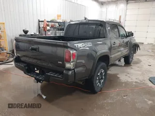 2021 Toyota Tacoma SR z VIN 5TFCZ5AN1MX268854, wystawiony jako IAAI lot #41608266 z przebiegiem 45 823 mil mil oraz . Historia ofert i sprzedaży dostępna na DreamBid. Obrazek 4.