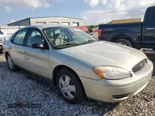 2005 Ford Taurus SE with VIN 1FAFP53U95A101336, listed as a Copart auction lot 56457095 with 127,656 mi miles and Salvage title. Bid and sale history available at DreamBid. Image 4.