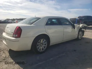 2006 Chrysler 300 with VIN 2C3KA43R16H506680, listed as a Copart auction lot 63416404 with 196,073 mi miles and Salvage Title. Bid and sale history available at carsss.com. Image 3.