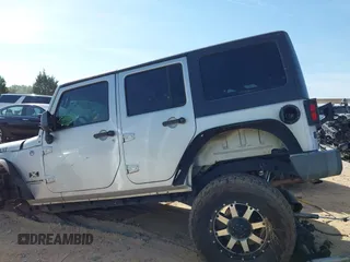 2007 Jeep Wrangler Unlimited X z VIN 1J4GA39137L114943, wystawiony jako IAAI lot #42080263 z przebiegiem Nie podano mil oraz . Historia ofert i sprzedaży dostępna na DreamBid. Obrazek 14.