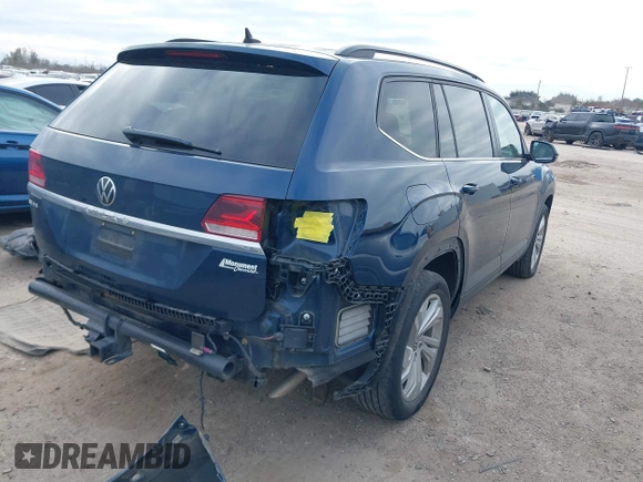 2021 Volkswagen Atlas SE z VIN 1V2JR2CA3MC555490, wystawiony jako IAAI lot #41286240 z przebiegiem 89 435 mil mil oraz . Historia ofert i sprzedaży dostępna na DreamBid. Obrazek 4.