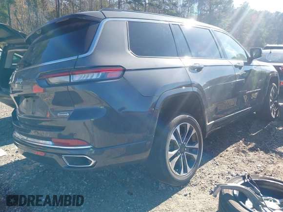 2022 Jeep Grand Cherokee Overland z VIN 1C4RJJDG6N8570854, wystawiony jako IAAI lot #40878737 z przebiegiem 19 947 mil mil oraz . Historia ofert i sprzedaży dostępna na DreamBid. Obrazek 4.