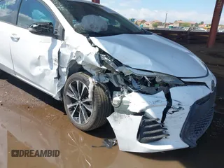 2017 Toyota Corolla L with VIN 2T1BURHE8HC814965, listed as a IAAI auction lot 42387645 with 230,303 mi miles and . Bid and sale history available at DreamBid. Image 6.