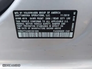2014 Volkswagen Passat Wolfsburg Ed with VIN 1VWAT7A38EC051892, listed as a IAAI auction lot 41523058 with 122,493 mi miles. Bid and sale history available at carsss.com. Image 9.