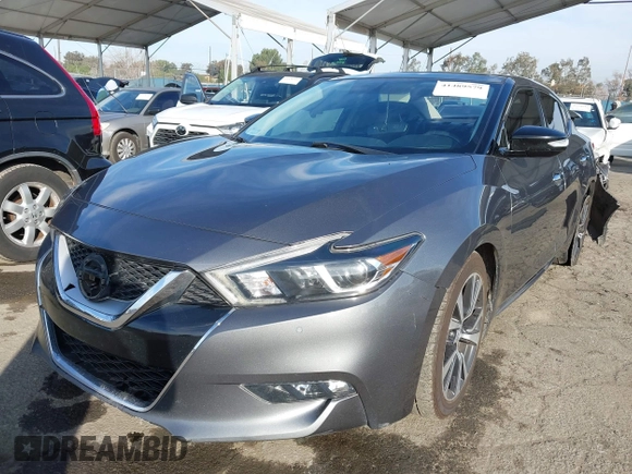 2017 Nissan Maxima SV with VIN 1N4AA6AP4HC404371, listed as a IAAI auction lot 41489579 with 117,677 mi miles. Bid and sale history available at carsss.com. Image 17.