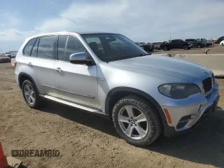 2011 BMW X5 35i z VIN 5UXZV4C55BL739114, wystawiony jako Copart lot #58393605 z przebiegiem 161 015 mil mil oraz Czysty tytuł • Clean title. Historia ofert i sprzedaży dostępna na DreamBid. Obrazek 4.