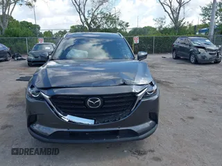 2022 Mazda CX-9 Touring Plus with VIN JM3TCBAY9N0624575, listed as a IAAI auction lot 42326284 with 16,572 mi miles and . Bid and sale history available at DreamBid. Image 12.