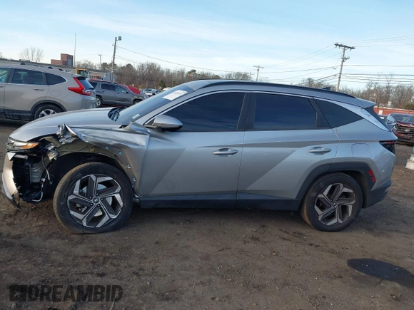 2022 Hyundai Tucson SEL with VIN 5NMJFCAE4NH060031, listed as a IAAI auction lot 41451874 with 57,228 mi miles and . Bid and sale history available at carsss.com. Image 14.