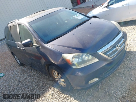 2007 Honda Odyssey Touring with VIN 5FNRL38807B023395, listed as a IAAI auction lot 42047062 with 240,552 mi miles. Bid and sale history available at carsss.com. Image 1.