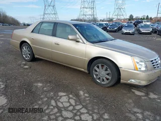 2006 Cadillac DTS 1SB z VIN 1G6KD57Y86U137620, wystawiony jako IAAI lot #41804268 z przebiegiem 152 998 mil mil oraz . Historia ofert i sprzedaży dostępna na DreamBid. Obrazek 1.