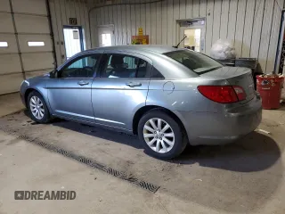 2010 Chrysler Sebring Limited with VIN 1C3CC5FB2AN217908, listed as a Copart auction lot 84085404 with 181,317 mi miles and Salvage Title. Bid and sale history available at carsss.com. Image 2.