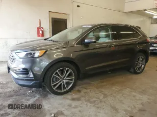2019 Ford Edge Titanium z VIN 2FMPK4K90KBB09728, wystawiony jako Copart lot #59208955 z przebiegiem 79 067 mil mil oraz Szkoda całkowita • Salvage title. Historia ofert i sprzedaży dostępna na DreamBid. Obrazek 1.