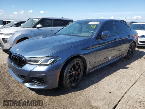2023 BMW 5 Series M550i xDrive with VIN WBA13BK08PCN51125, listed as a Copart auction lot 76781294 with 8,855 mi miles and Non repairable. Bid and sale history available at DreamBid. Image 1.