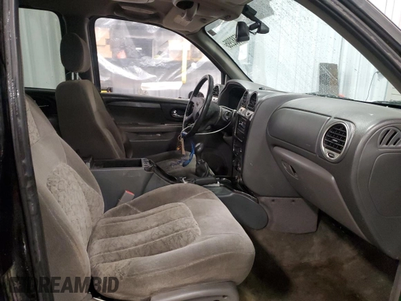 2002 GMC Envoy SLT with VIN 1GKDT13S022462940, listed as a Copart auction lot 45882995 with 232,828 mi miles and Clean Title. Bid and sale history available at carsss.com. Image 7.