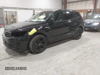 2024 Volkswagen Tiguan SE R-Line Black with VIN 3VV8B7AX8RM103700, listed as a IAAI auction lot 41991238 with 5,084 mi miles and . Bid and sale history available at DreamBid. Image 21.