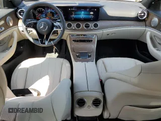 2023 Mercedes-Benz E 350 with VIN W1KZF8EB5PB132464, listed as a Copart auction lot 64983954 with 2,775 mi miles and Salvage Title. Bid and sale history available at DreamBid. Image 8.