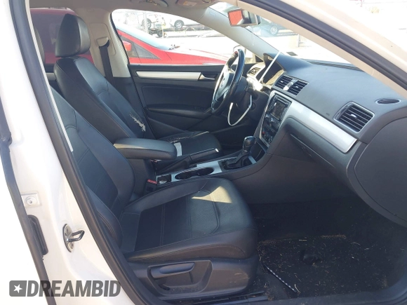 2013 Volkswagen Passat SE w/Sunroof & Nav with VIN 1VWBP7A32DC017647, listed as a IAAI auction lot 41991170 with 270,917 mi miles. Bid and sale history available at carsss.com. Image 5.