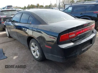 2014 Dodge Charger SE with VIN 2C3CDXBG8EH267589, listed as a IAAI auction lot 41793004 with 154,771 mi miles and . Bid and sale history available at DreamBid. Image 3.
