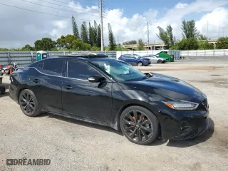 2023 Nissan Maxima SR with VIN 1N4AA6EV3PC513170, listed as a Copart auction lot 78633004 with 6,231 mi miles and Salvage Title. Bid and sale history available at carsss.com. Image 4.