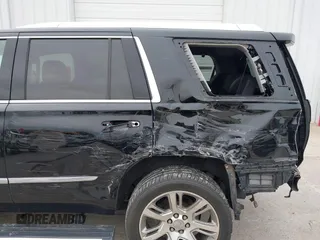 2018 Cadillac Escalade Premium Luxury z VIN 1GYS4CKJ1JR279129, wystawiony jako IAAI lot #42183231 z przebiegiem 130 086 mil mil oraz . Historia ofert i sprzedaży dostępna na DreamBid. Obrazek 6.