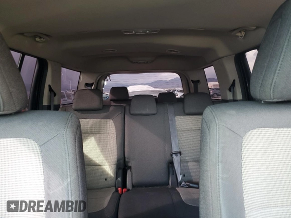2010 Ford Flex SEL z VIN 2FMGK5CC6ABA24939, wystawiony jako Copart lot #51869795 z przebiegiem 174 987 mil mil oraz Szkoda całkowita • Salvage title. Historia ofert i sprzedaży dostępna na DreamBid. Obrazek 10.