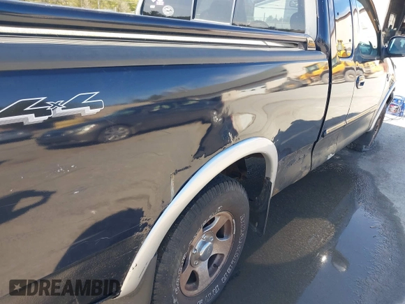 2001 Ford F-150 XL with VIN 2FTRX18L01CA83673, listed as a IAAI auction lot 41943618 with 130,717 mi miles. Bid and sale history available at carsss.com. Image 6.