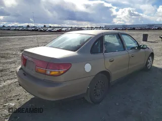 2000 Saturn LS z VIN 1G8JU52F0YY638148, wystawiony jako Copart lot #44614584 z przebiegiem 104 794 mil mil oraz Tytuł czysty. Historia ofert i sprzedaży dostępna na DreamBid. Obrazek 3.